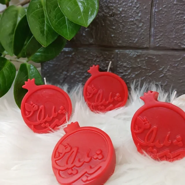 شمع انار شب یلدا با نوشته «شب یلدا»